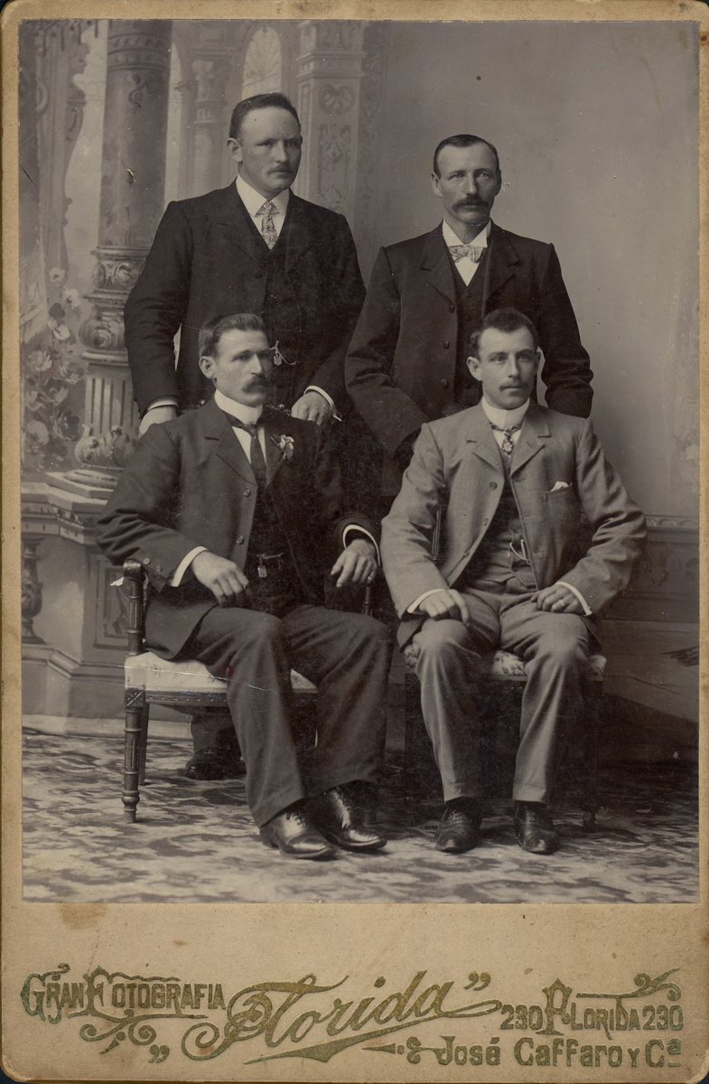 Four male employees of Sunshine Harvesters (1930–35)