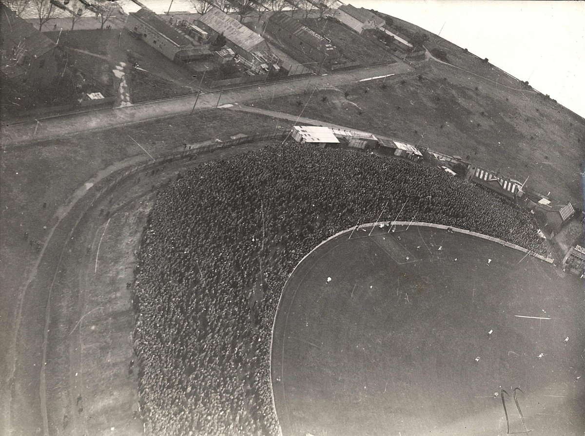 Aerial view of part of the South Melbourne Cricket Ground, with football match in progress, East Melbourne (1920–40)