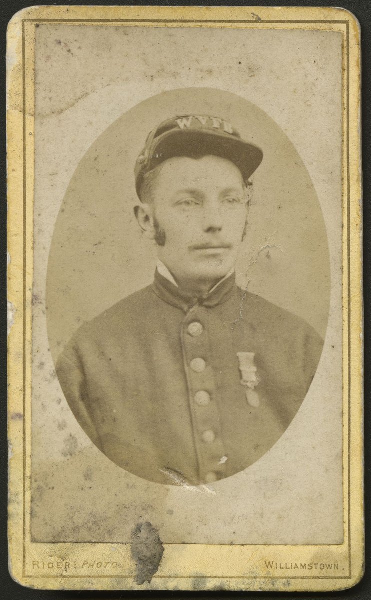 Young man wearing uniform of the Williamstown Volunteer Fire Brigade (1860–91)