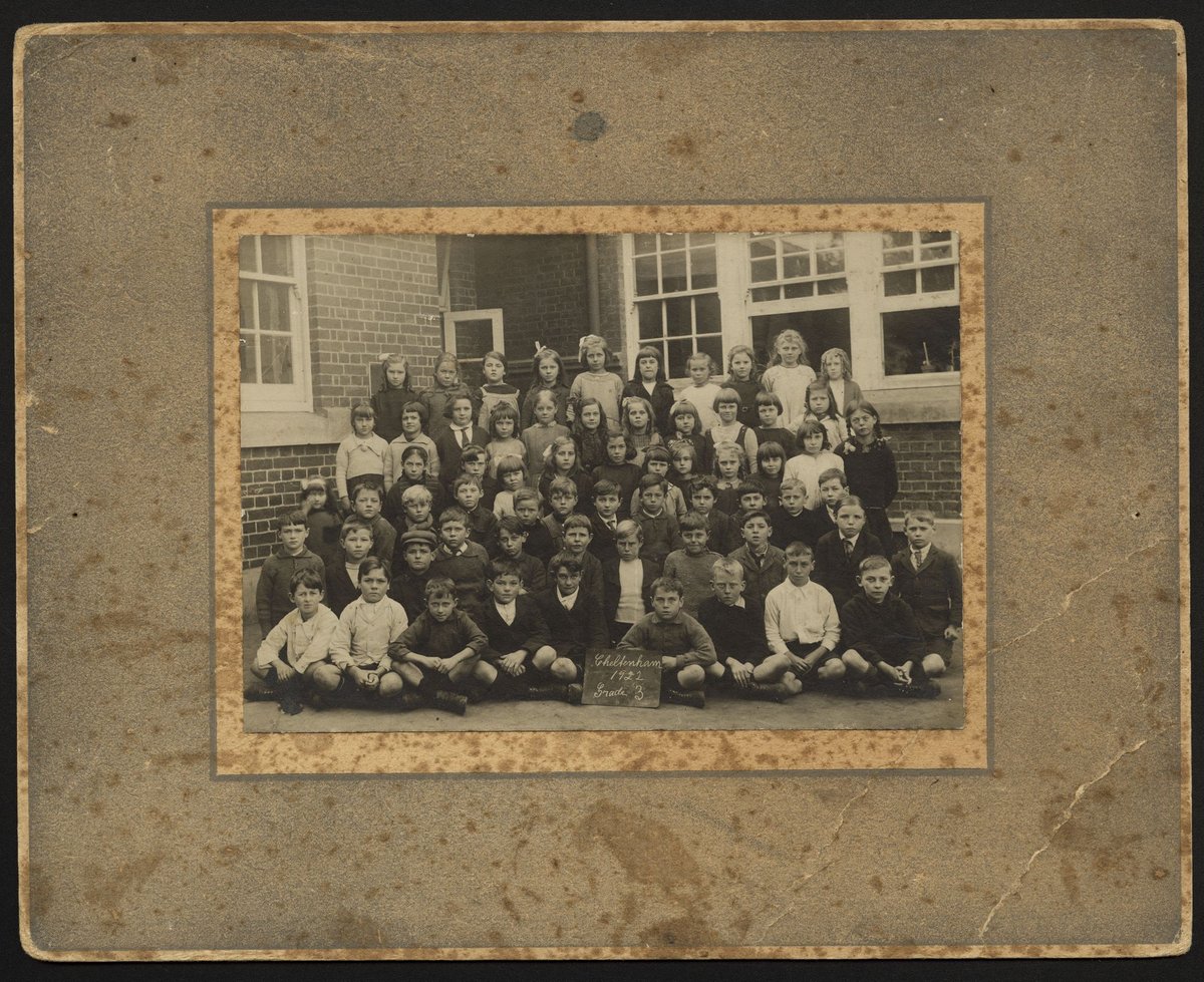 Children gathered for a school photograph, Cheltenham (1922)