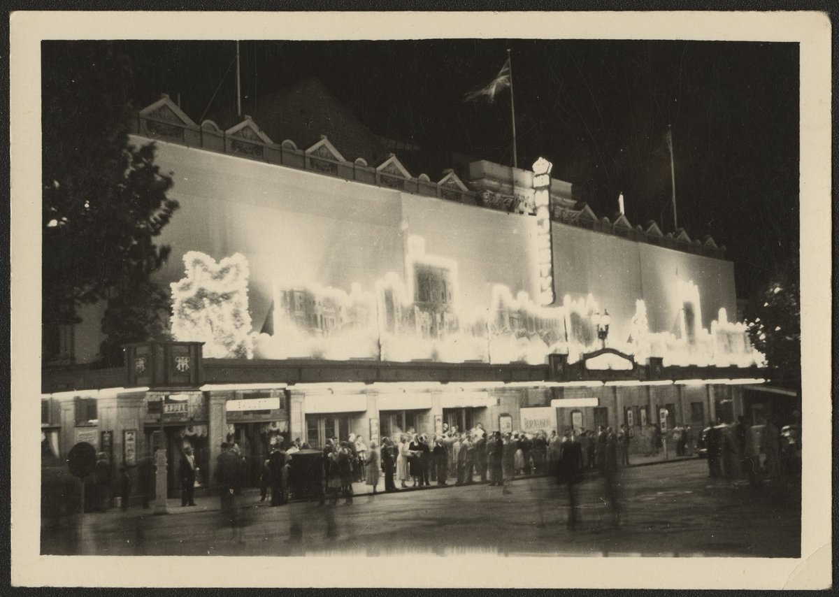 Floodlit exterior of Her Majesty's Theatre, during the Royal Visit, Melbourne, Melbourne City (1954)