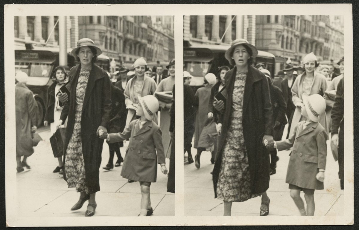 Woman and child walking on a crowded footpath, Melbourne (1920–50)