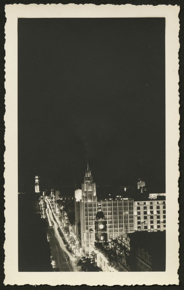 Elevated view of Collins Street at night, Melbourne, Melbourne City (1930–50)