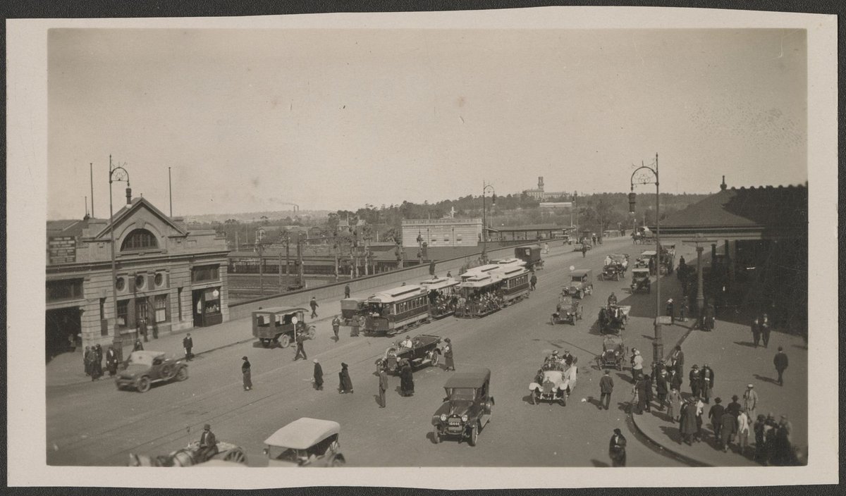 Elevated view looking south east across the intersection of Flinders and Swanston Streets in Melbourne, Melbourne City (1920s)