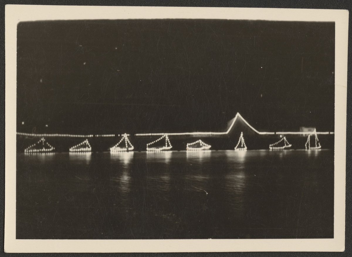 Bridge across Yarra River, outlined in lights, Melbourne (1954)