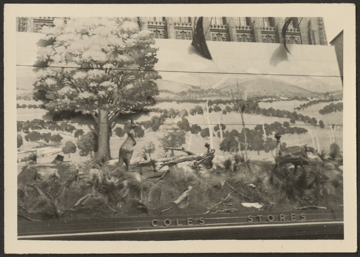 Part of the decorative boarding over Coles Department Store, Bourke Street in Melbourne, Melbourne City (1954)