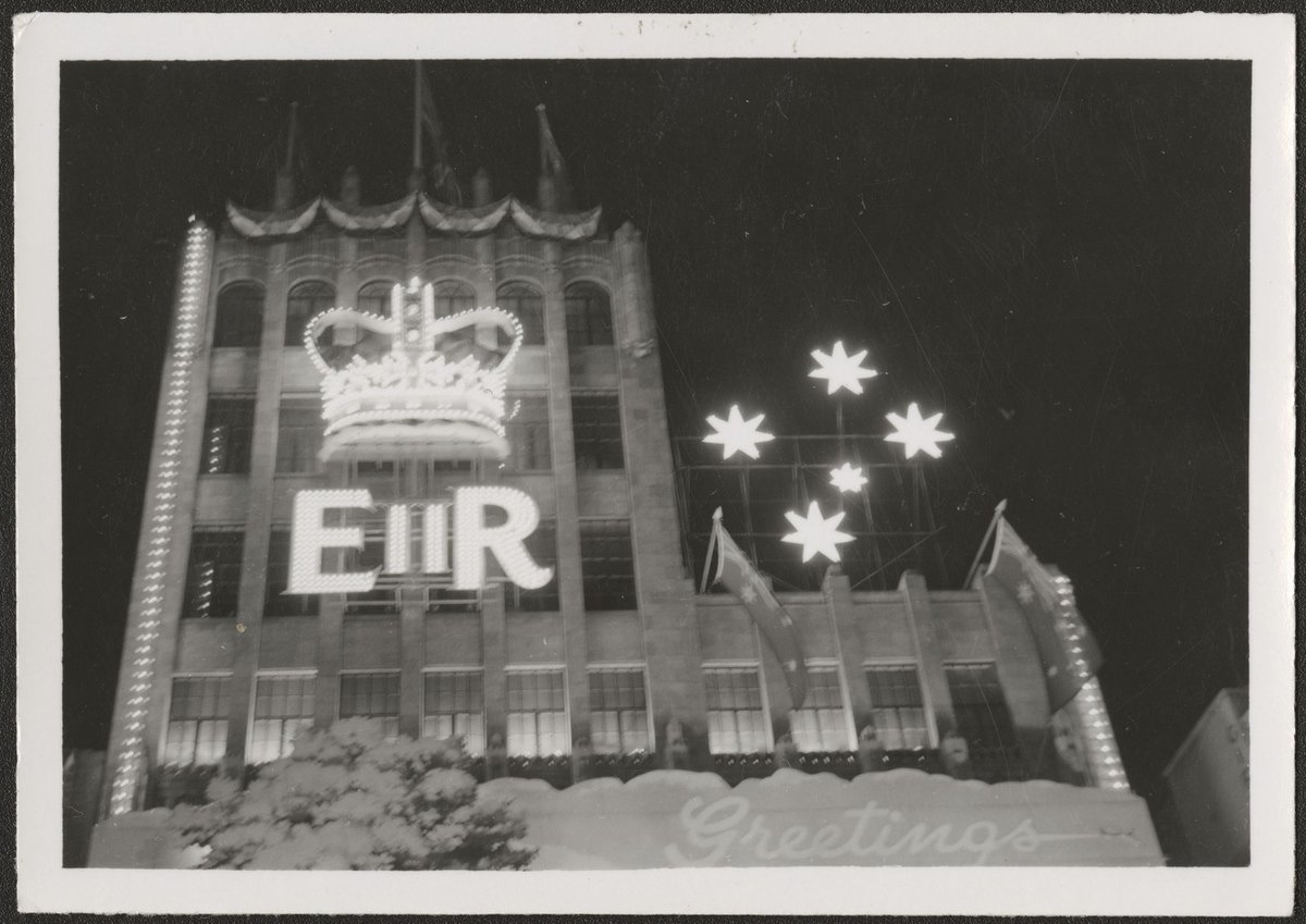 Illuminated crown and lettering on the facade of the Coles Store, Bourke Street, Melbourne, Melbourne City (1954)