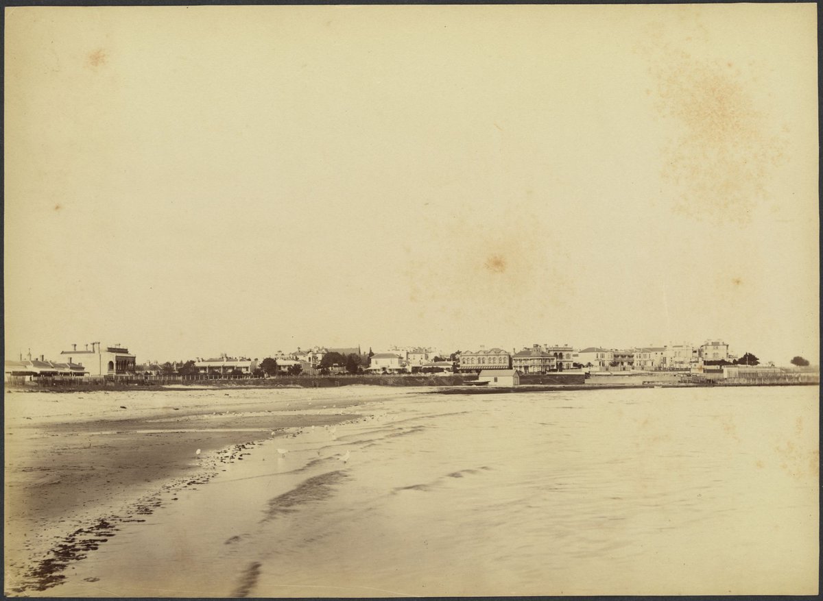 View of St. Kilda Esplanade showing buildings and beach from shoreline, St Kilda (1888?)