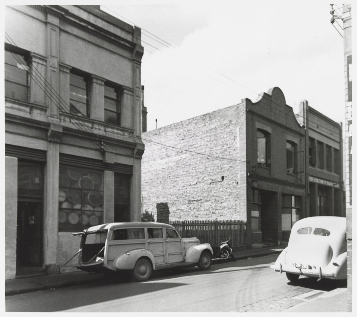 Little Lonsdale Street - north side, looking west from no. 46, Melbourne City (1950)