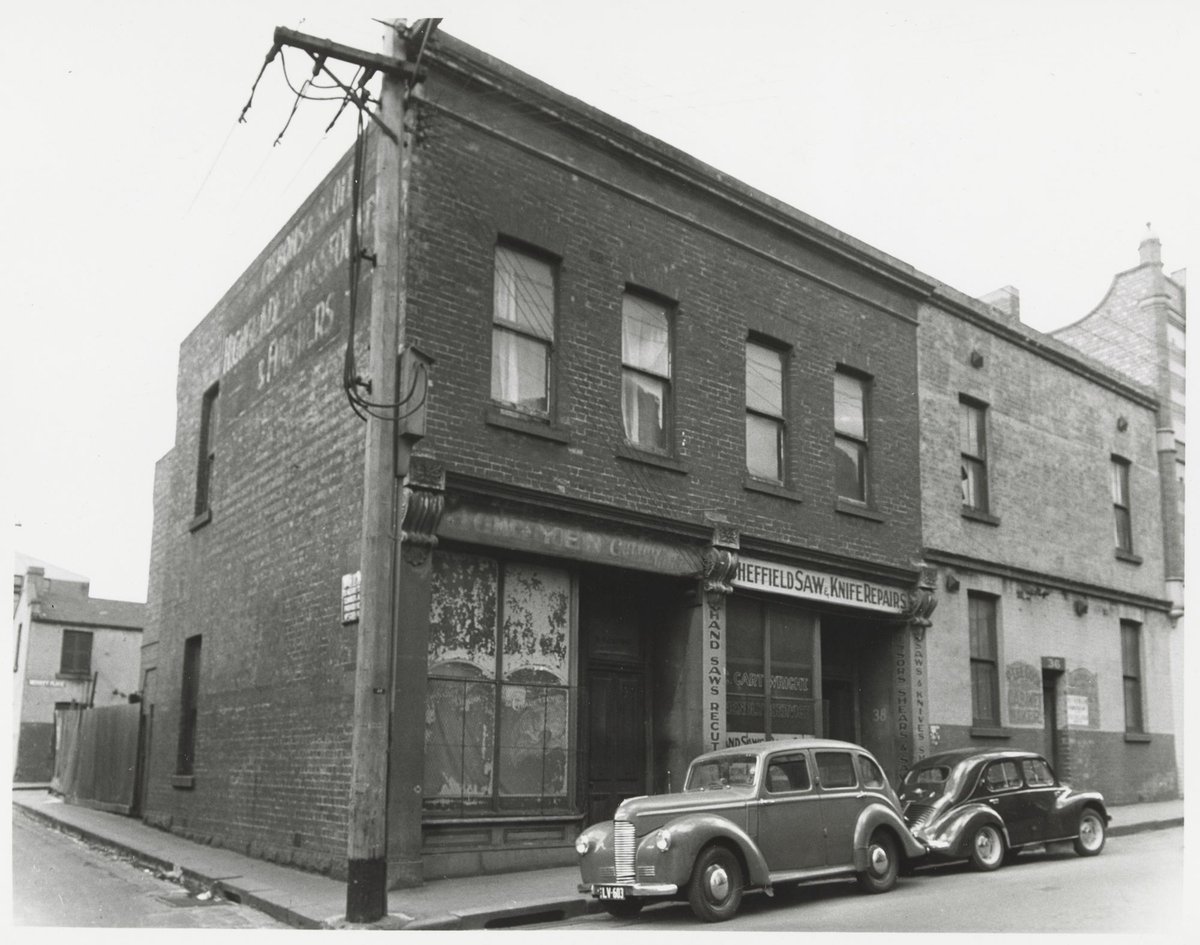 Little Lonsdale Street - north side, looking at corner with Burton Street down to Merritt's Place, Melbourne City (1950)