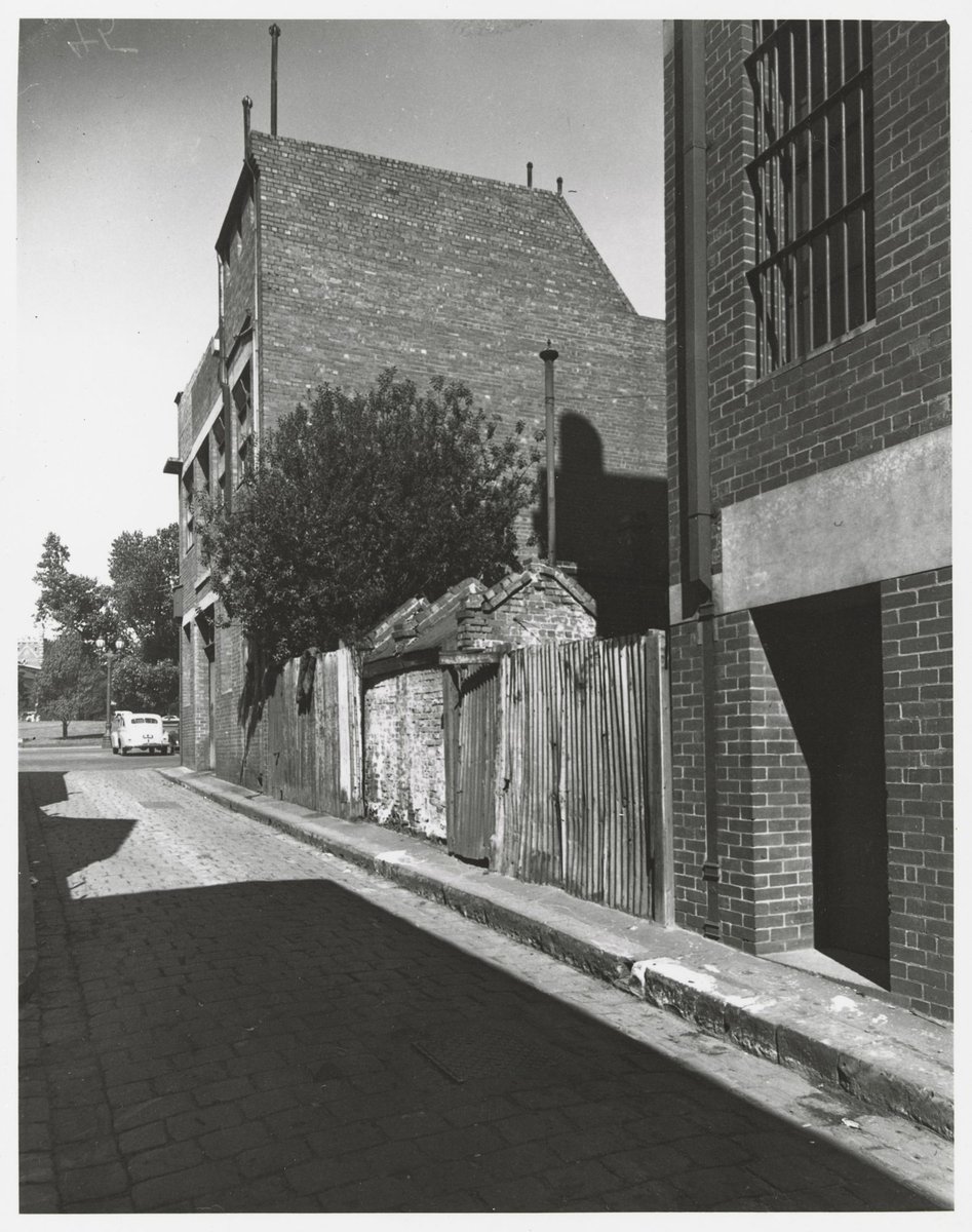 Surry Place - south side, looking towards Spring Street, Melbourne City (1950)