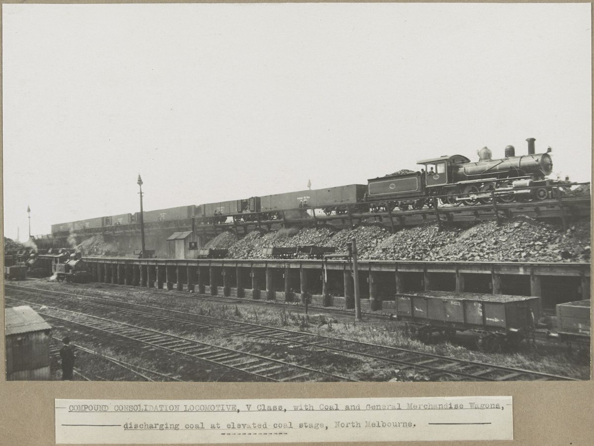 COMPOUND CONSOLIDATION LOCOMOTIVE, V Class, with Coal and General Merchandise Wagons, discharging coal at elevated coal stage, North Melbourne (1905–28)