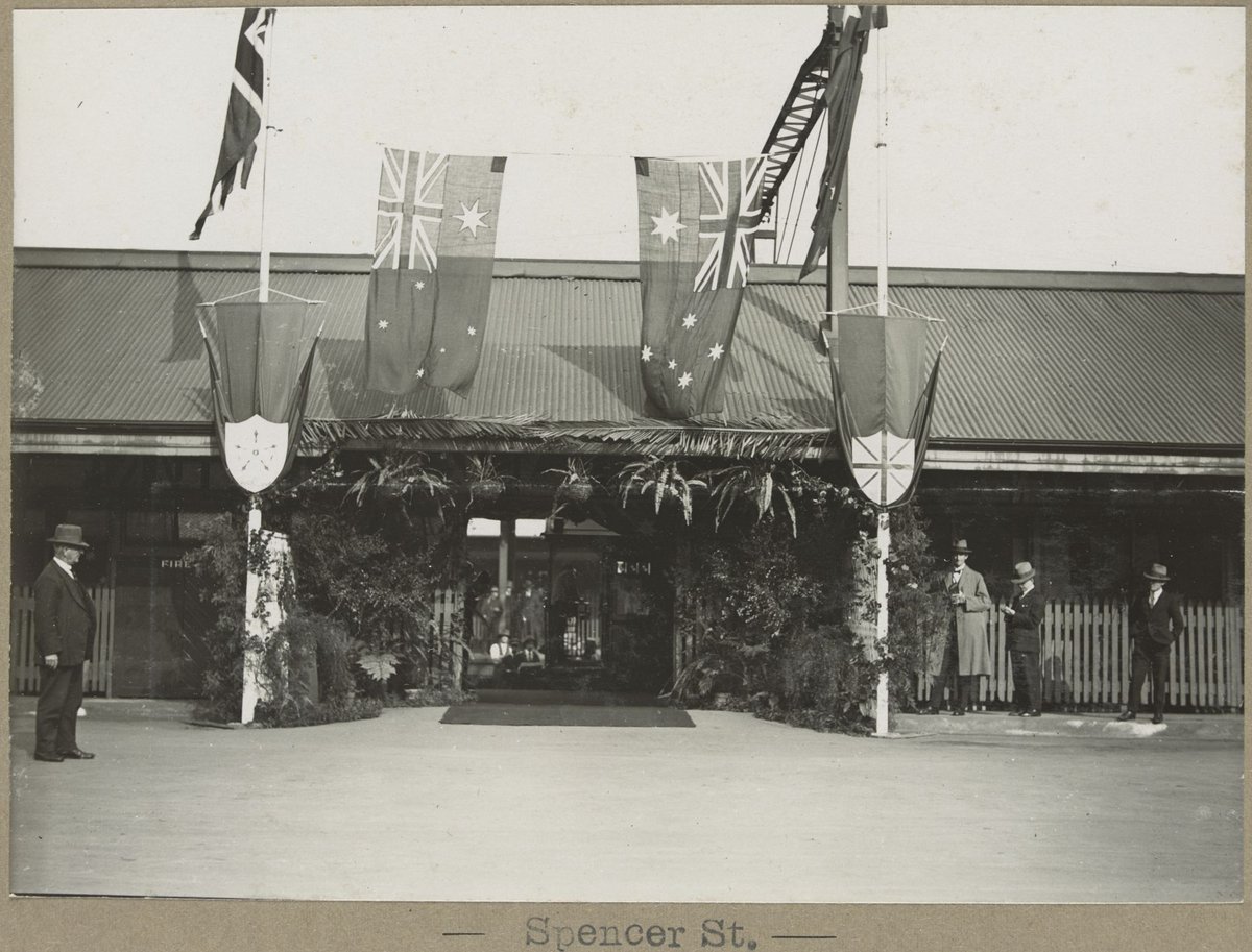Spencer St. [Flags decorating entrance.], Melbourne City (1905–28)