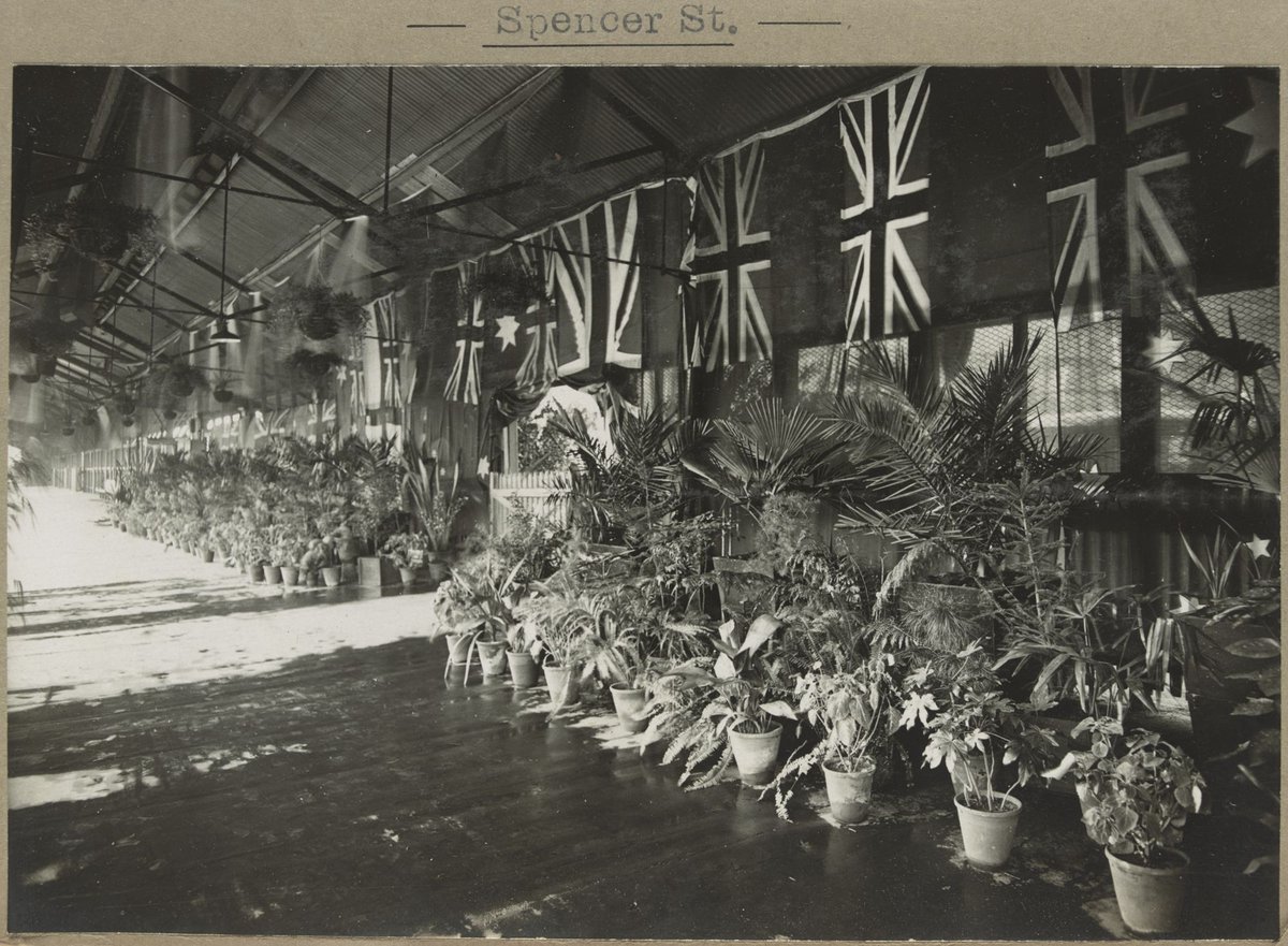 Spencer St. [Sprinkler system watering potted plants on platform.], Melbourne City (1905–28)