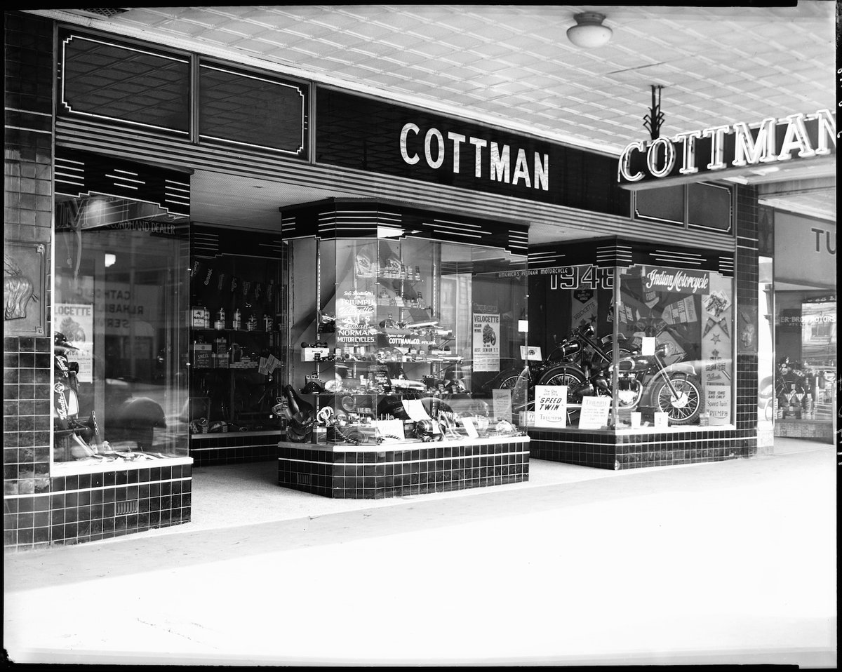 Motorcycle and bicycle shops of Milledge Bros. at 287-9, Cottman & Co. at 291-3 and Turner Bros. at 295 Elizabeth St., Melbourne, Melbourne City (1948)