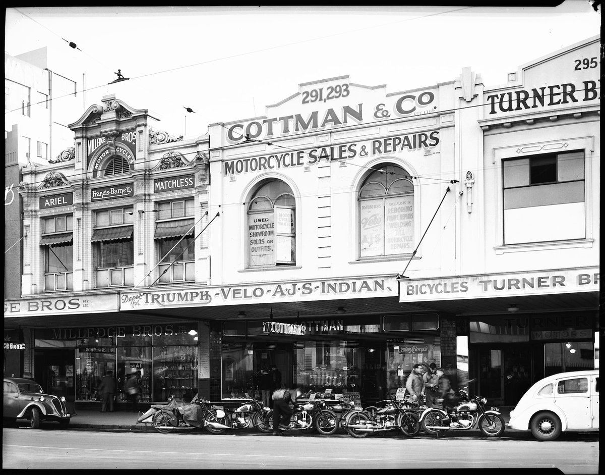 Motorcycle and bicycle shops of Milledge Bros. at 287-9, Cottman & Co. at 291-3 and Turner Bros. at 295 Elizabeth St., Melbourne, Melbourne City (1948)