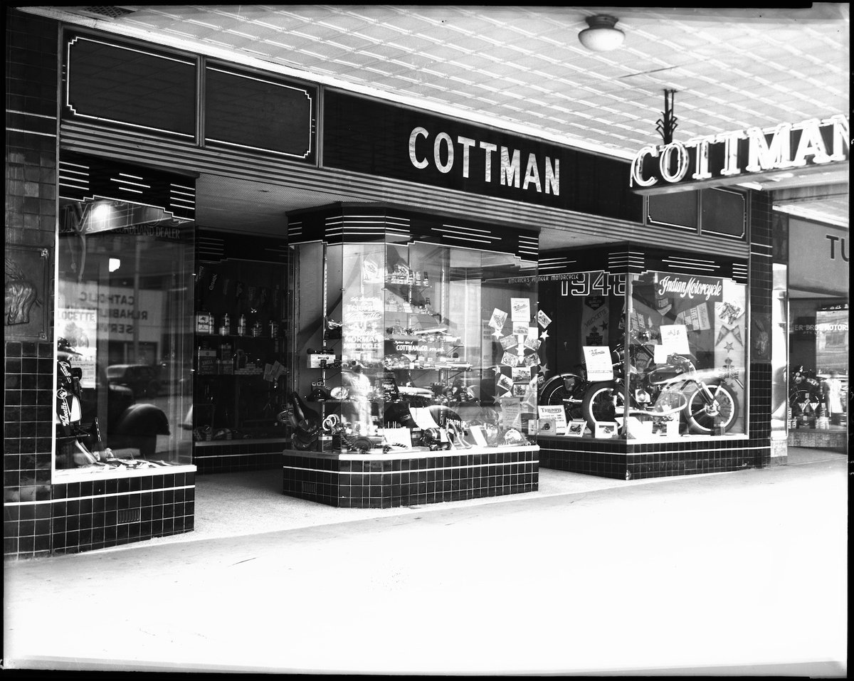 Motorcycle and bicycle shops of Milledge Bros. at 287-9, Cottman & Co. at 291-3 and Turner Bros. at 295 Elizabeth St., Melbourne, Melbourne City (1948)