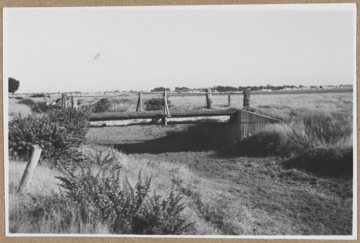 "Floating gates at Barwon River breakwater, Wadsleys drain occupation crossing, Carrum drainage district, Eildon training course" (1959?)