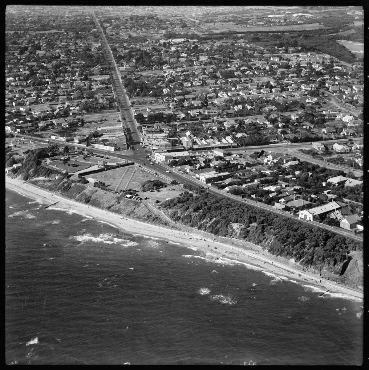 Aerial views of shopping area and gardens, Black Rock, looking east and north west (1950)