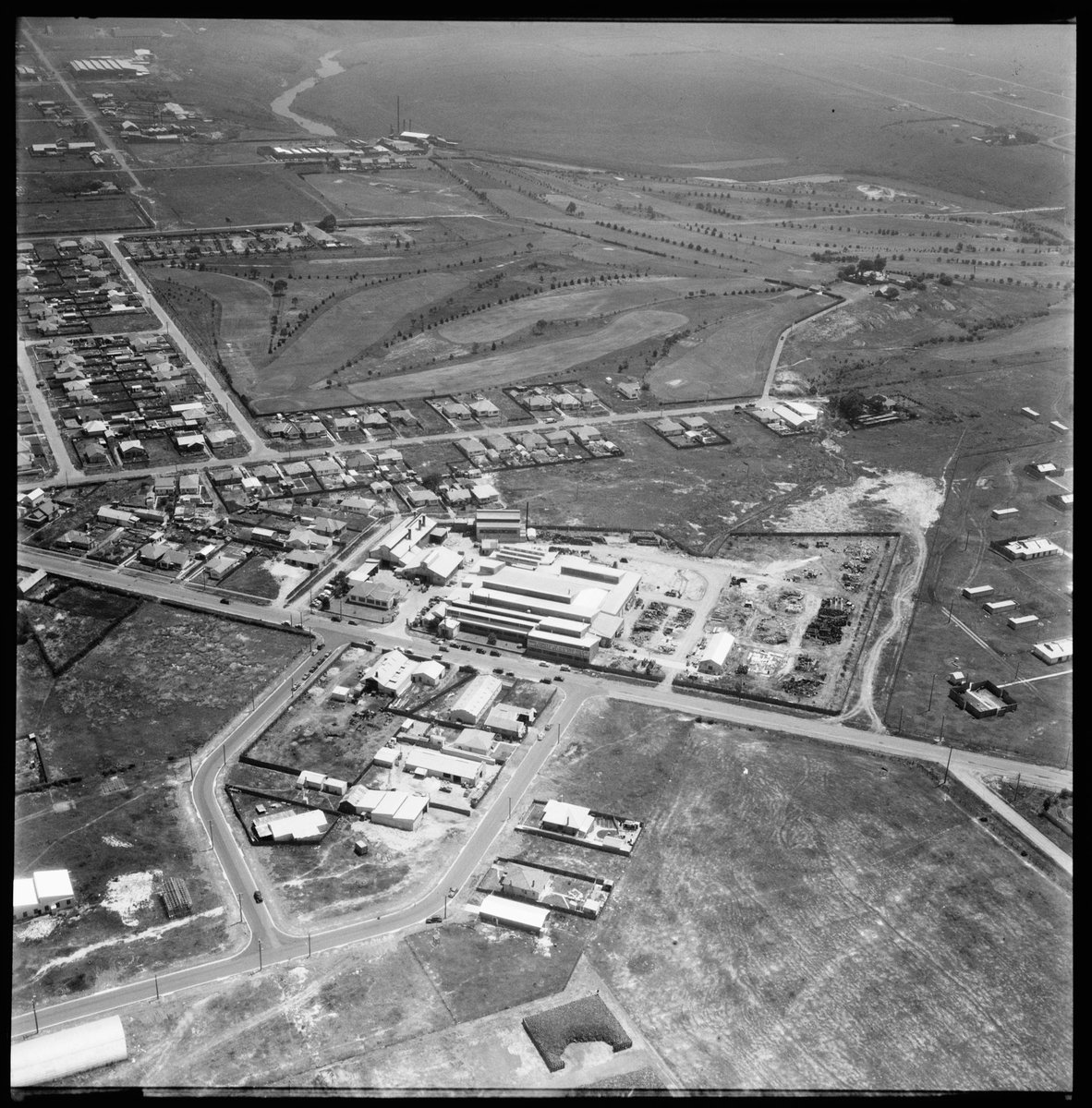 Aerial view of building for Extruded Metals Pty Ltd, Braybrook, Victoria (1954)