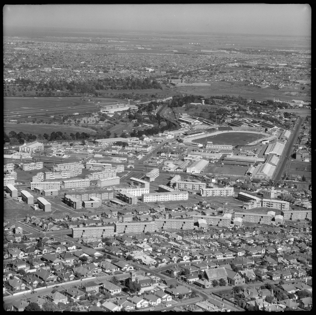 Aerial views of new housing commission residences in Ascot Vale, Victoria, looking south (1954)