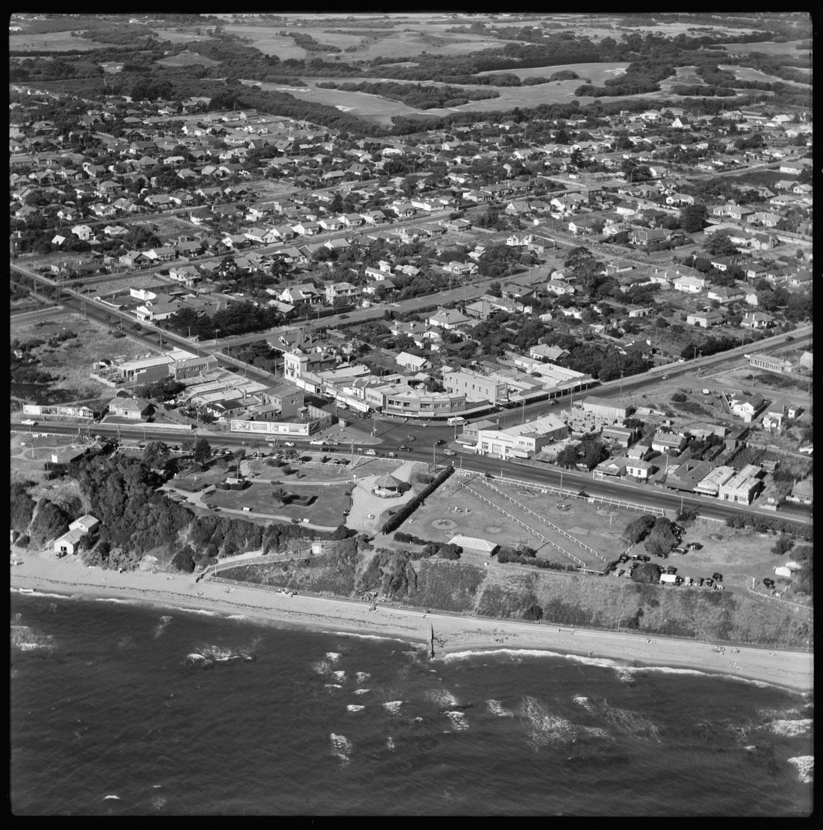 Aerial views of shopping area and gardens, Black Rock, looking east and north west (1950)