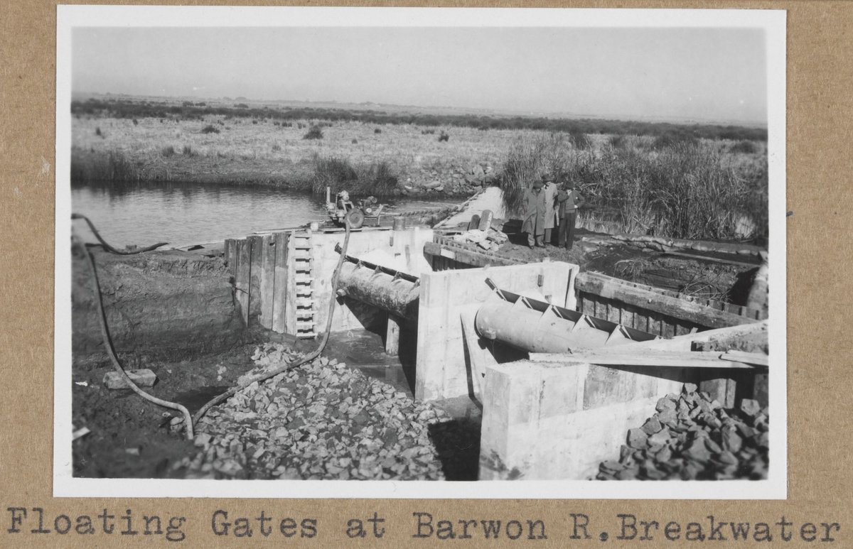 "Floating gates at Barwon River breakwater, Wadsleys drain occupation crossing, Carrum drainage district, Eildon training course" (1959?)