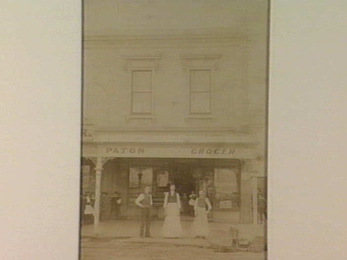 Staff oustide the premises of Paton, Grocer, Williamstown (c. 1877)