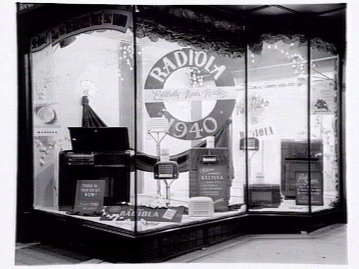 Window display of Radiola radios and gramophone at Allan's, 276 Collins Street, Melbourne, Melbourne City (c. 1940)