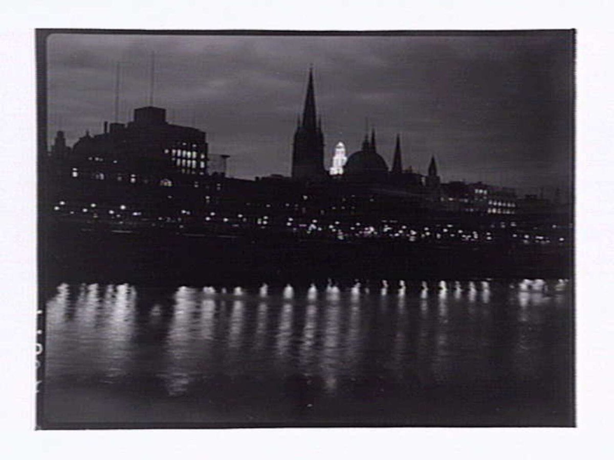 Flinders St. Station by night Riverside Ave, Melbourne City (1946)