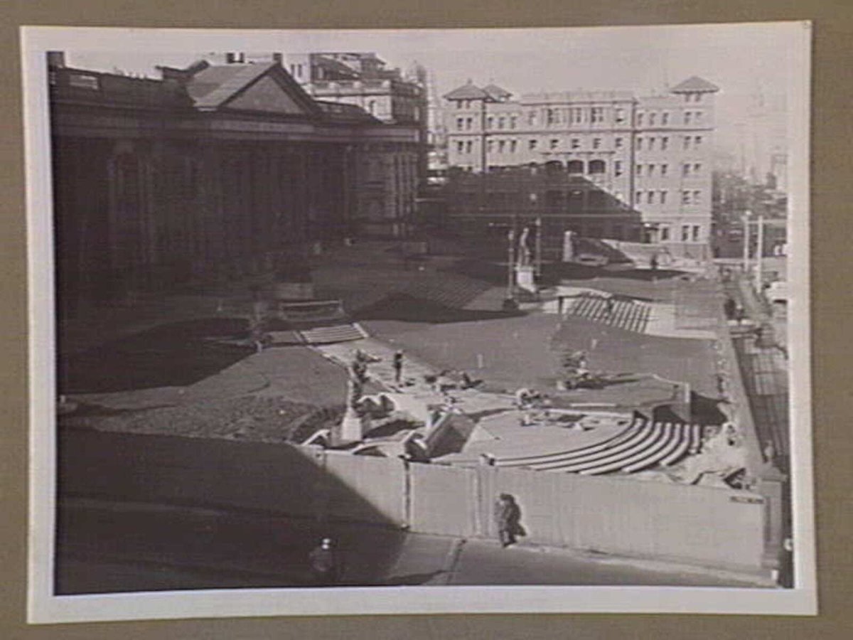 View of front approach, State Library of Victoria, from Welch Margetsons, La Trobe Street, immediately prior to planting of first trees, Melbourne City (1939)