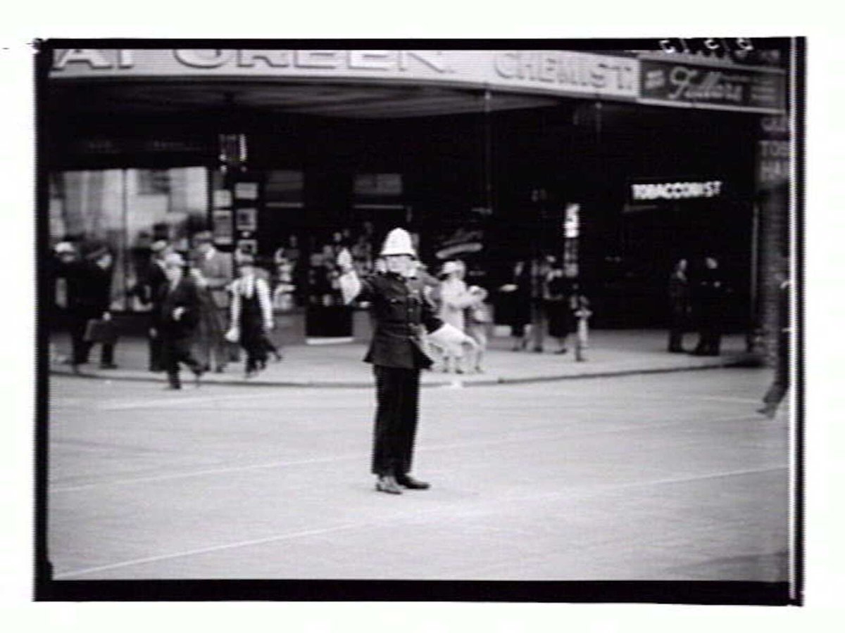 Policeman directing pedestrian traffic in Melbourne (1936–39)