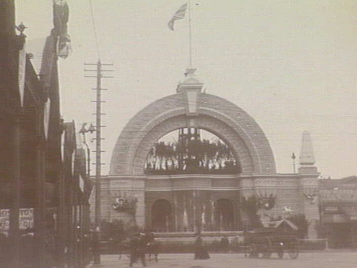 Flinders Street Railway Station, decorated for the occasion of the tour of the Duke and Duchess of York and Cornwall, Melbourne City (1901)