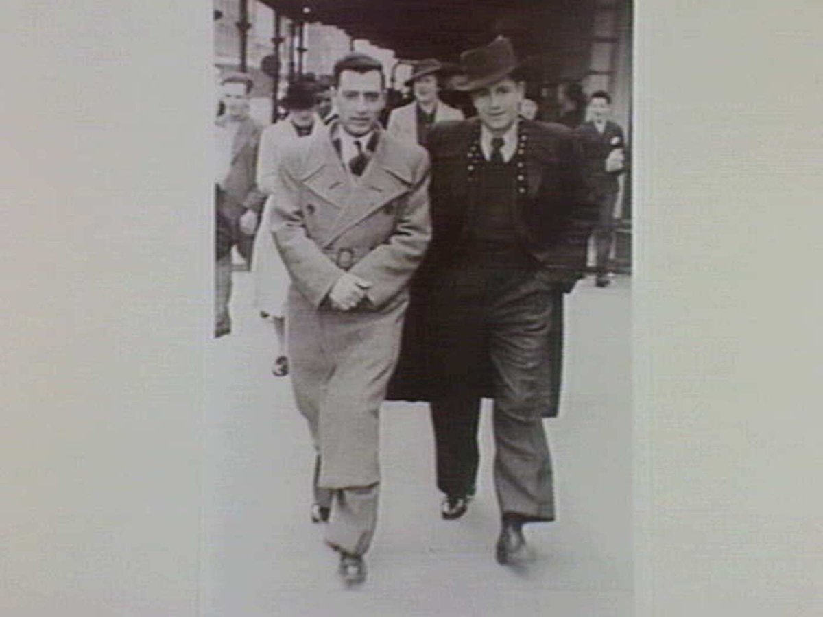 Spiro Polites and George Cass in Swanston St., soon after arrival 1939. Dressed up for a Sunday stroll, Melbourne City
