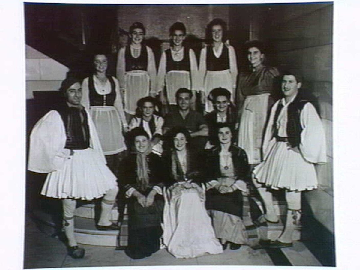 A Greek folk dancing group at rehearsal at Melbourne Town Hall for an international pageant organised by the International Club, August, 1945, Melbourne City