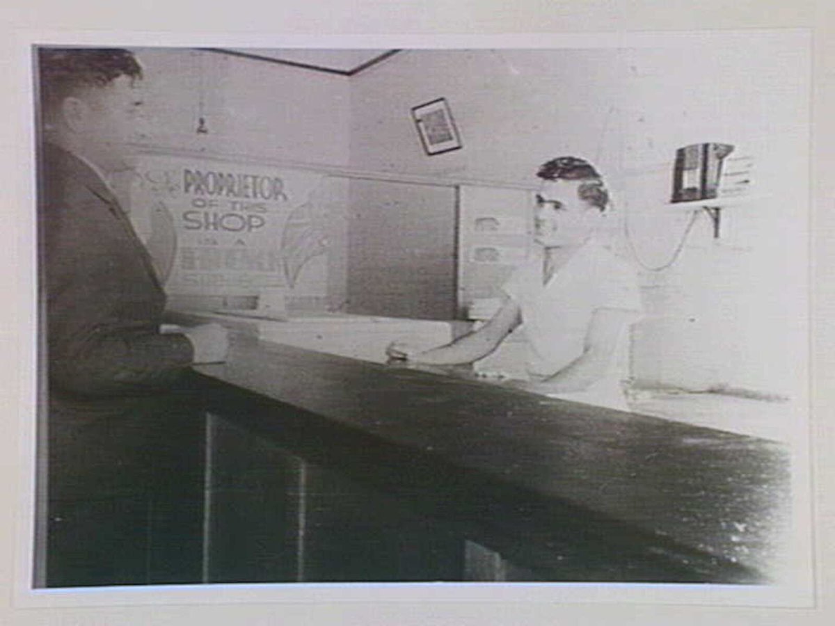 Mick Bacash in his first shop in Fitzroy 1938
