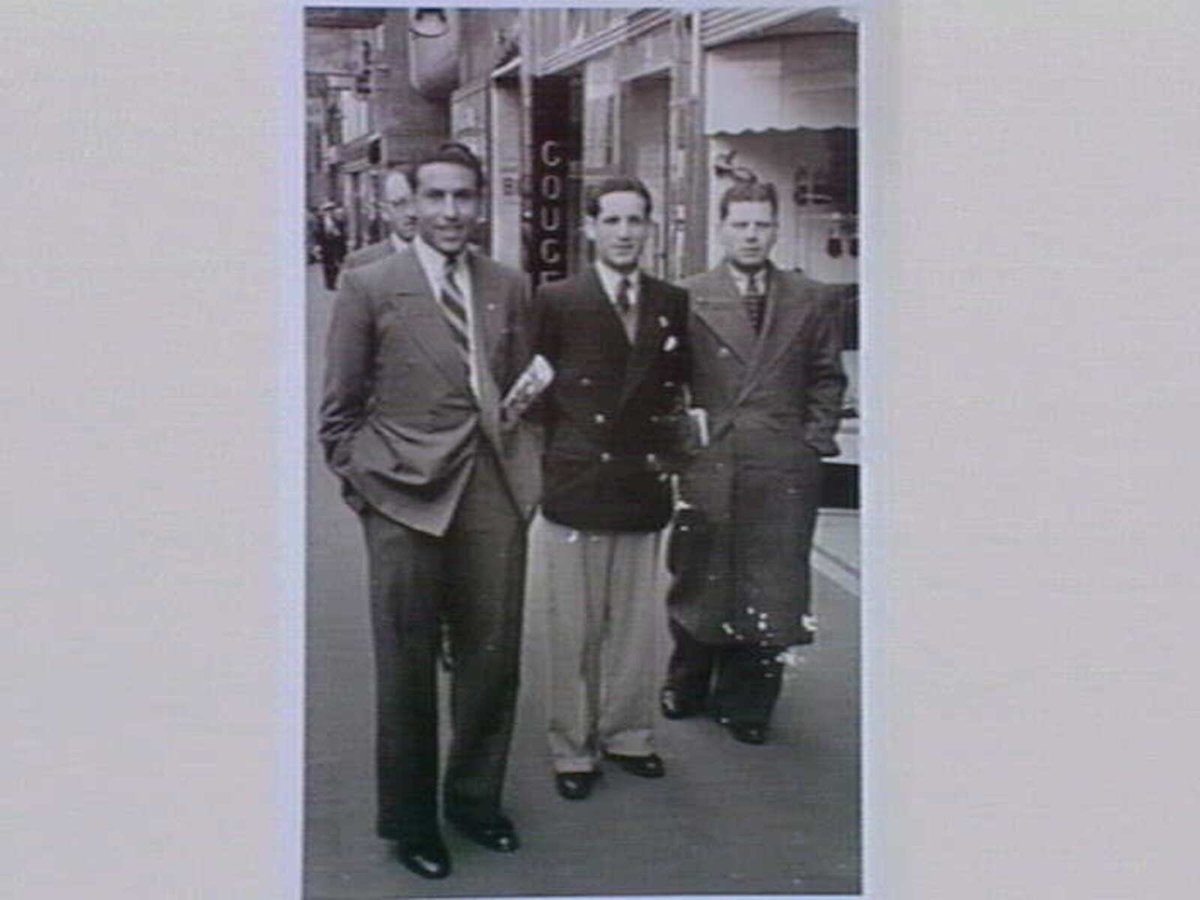 J. Dougall (left), C. Cassar and a friend in Collins St., Melbourne. 1949, Melbourne City