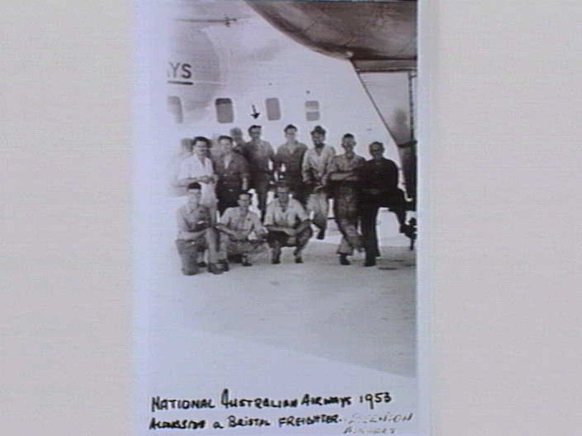 A maintenance crew from Australian National Airways beside a Bristol freighter, Essendon. 1953