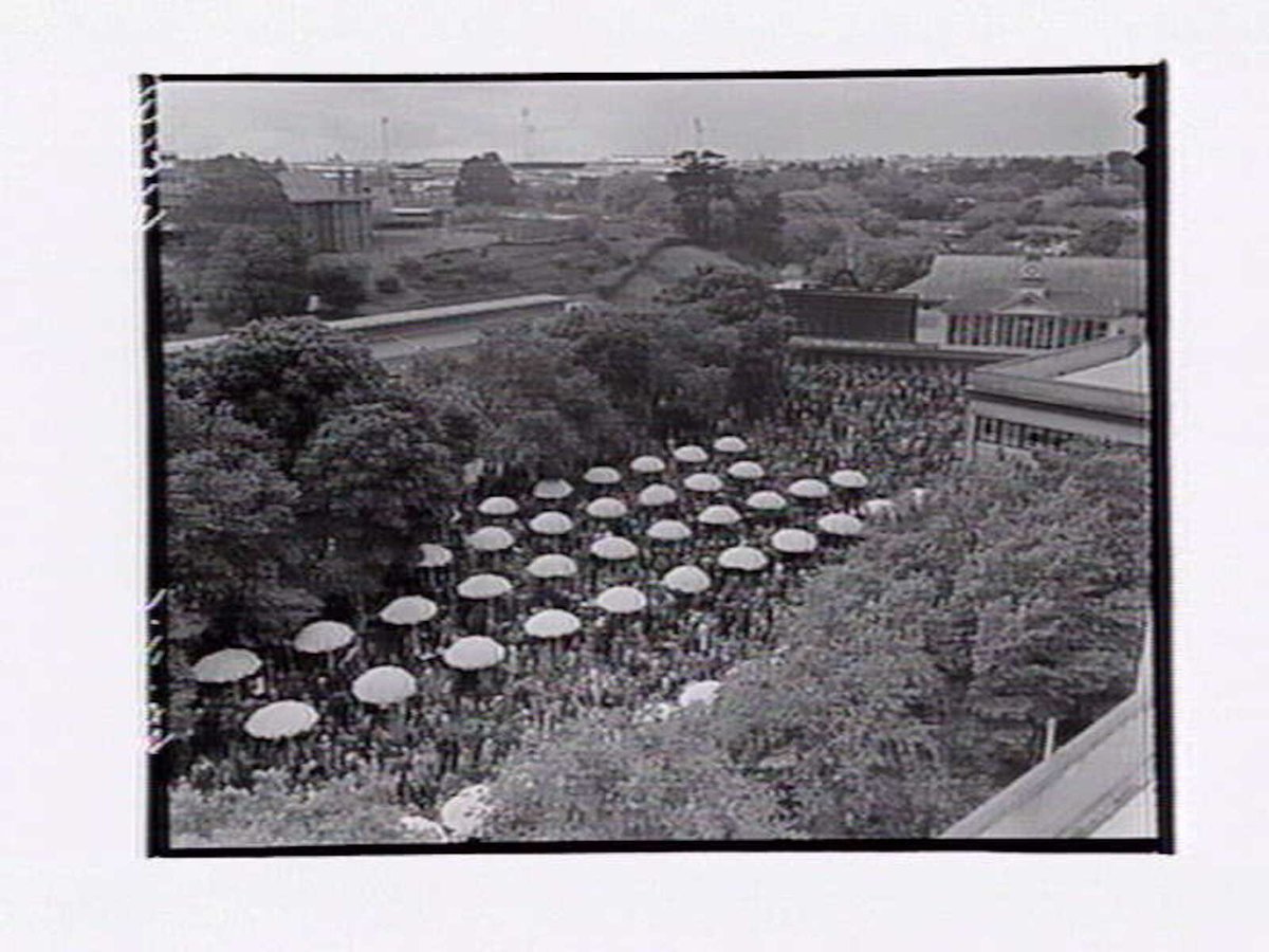 Bird's-eye view of Flemington Racecourse, showing crowd and buildings on Melbourne Cup Day (1949)
