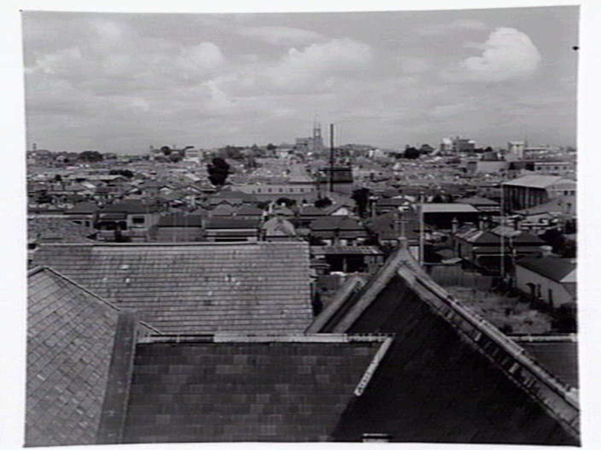 Elevated view over the rooftops of Richmond with Pelaco factory in distance (c. 1941)