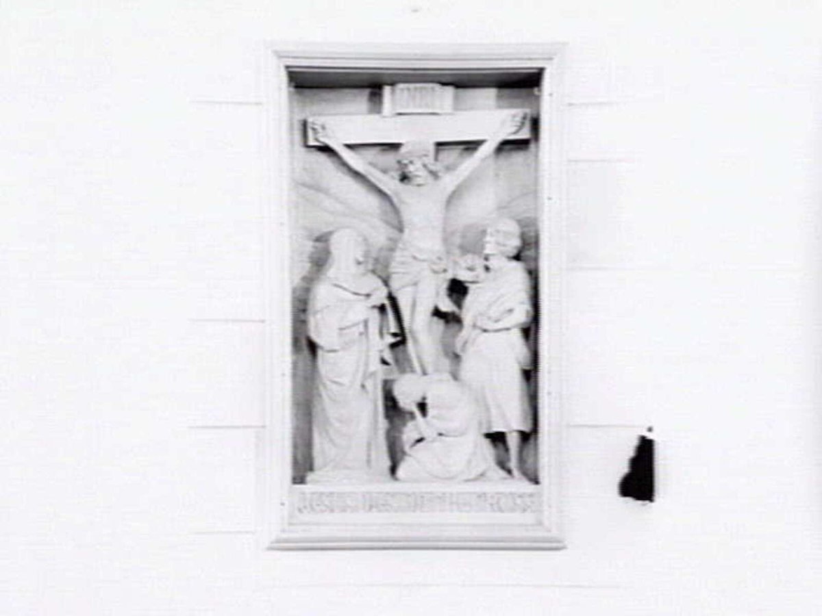 Relief sculpture entitled "Jesus dies on the cross", at Newman College Chapel in the grounds of University of Melbourne, Parkville (1935)