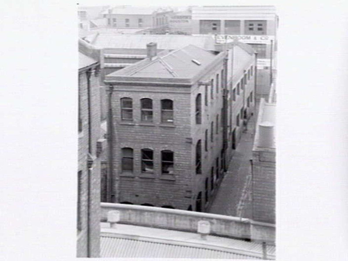 Rear, Phoenix Press Building, 359 Little Lonsdale Street, Melbourne and part of rear of Zevenboom & Co., 333 Elizabeth Street, Melbourne, Melbourne City (c. 1946)