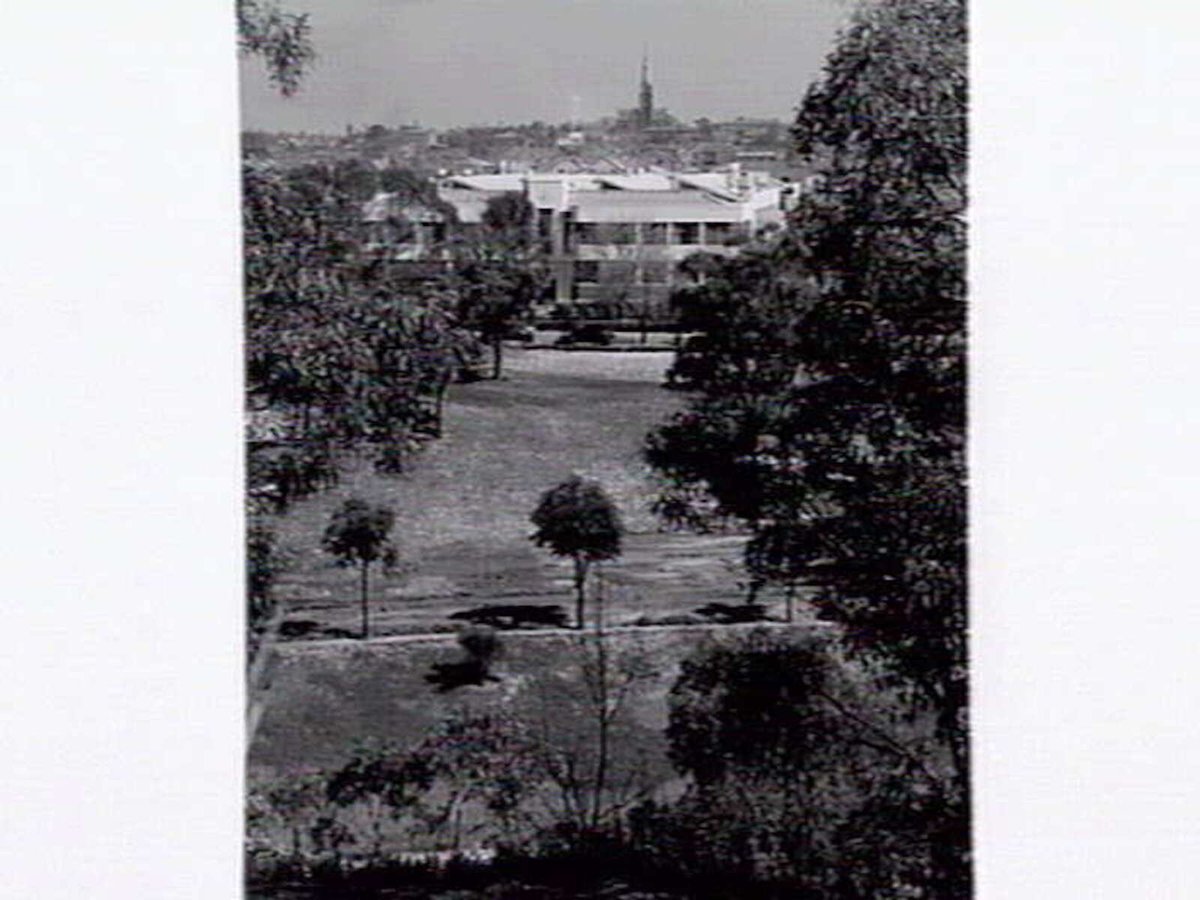 View of Melbourne across a park (1947)