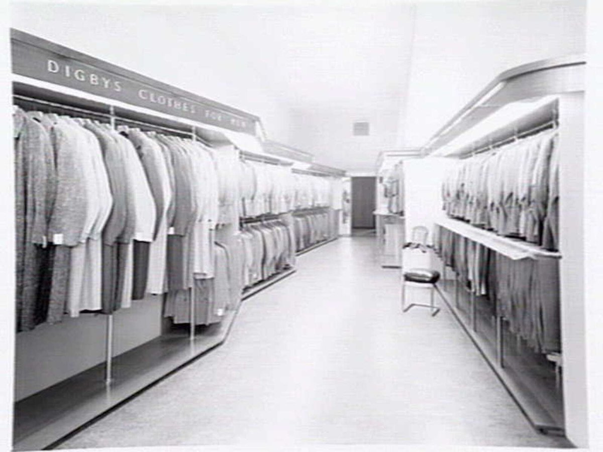 Interior of Digby's Mens Store, 168 Swanston St., Melbourne, showing racks of tailor-made suits and overcoats, Melbourne City (1948)