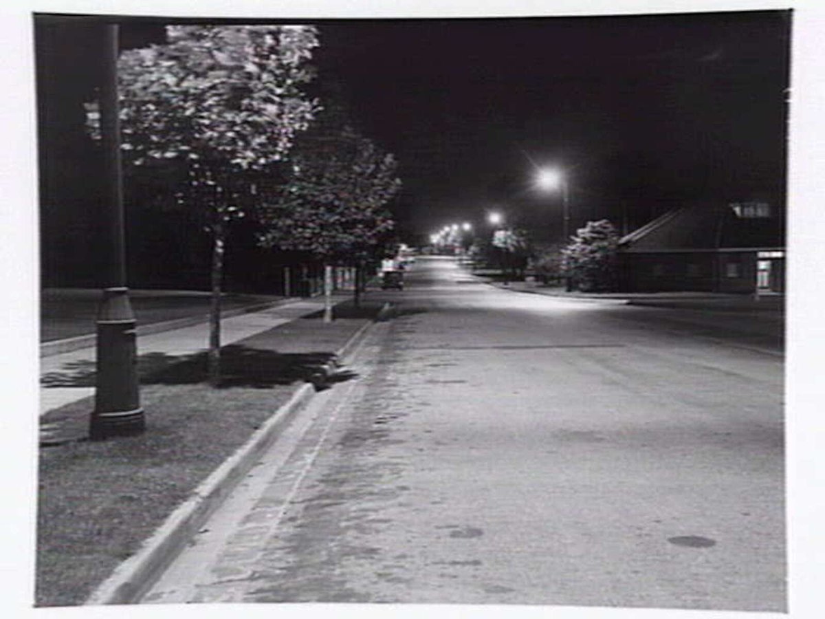 Suburban street Box Hill, at night (1949)