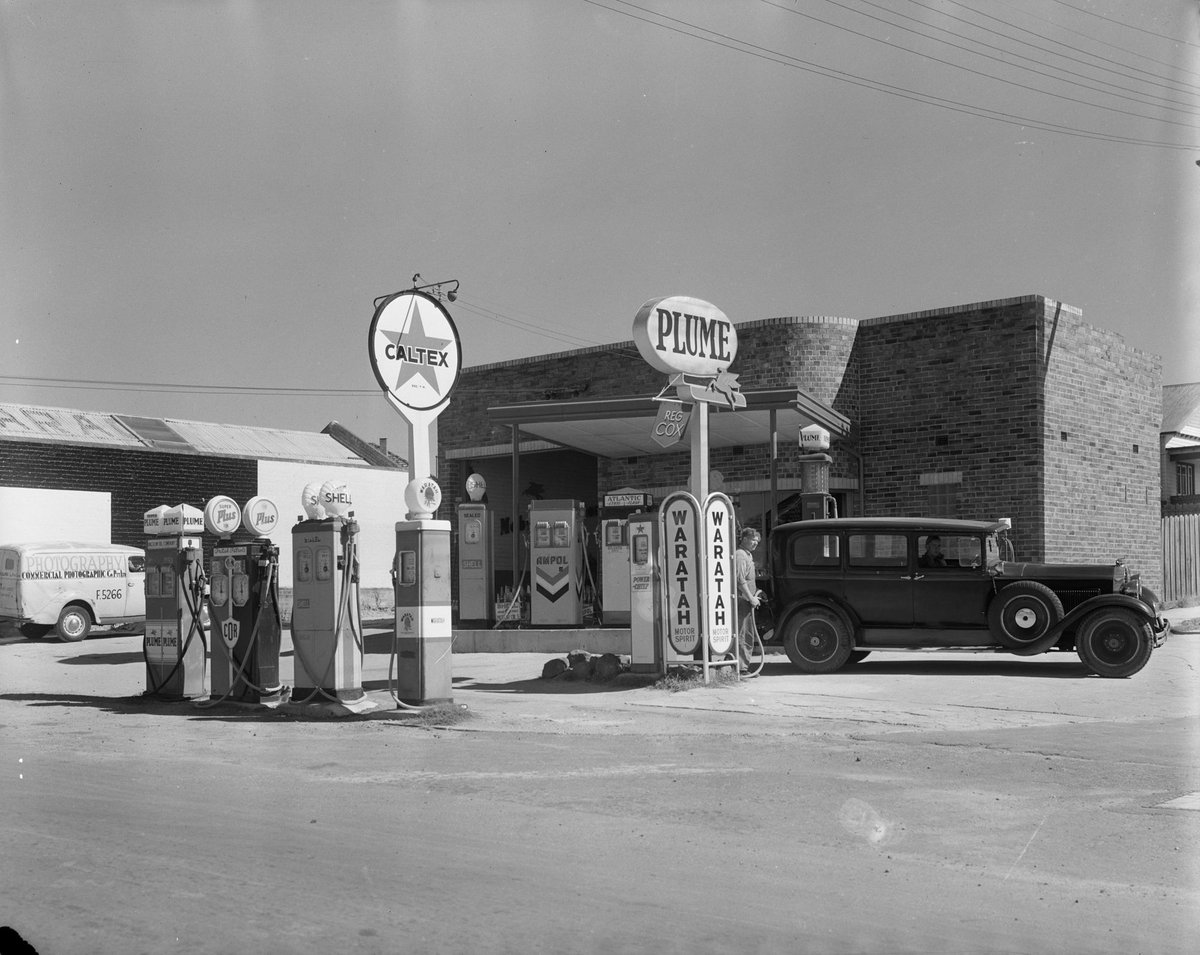 Van parked at Reg Cox's Plume Service Station, Plenty Rd., Reservoir (c. 1949)