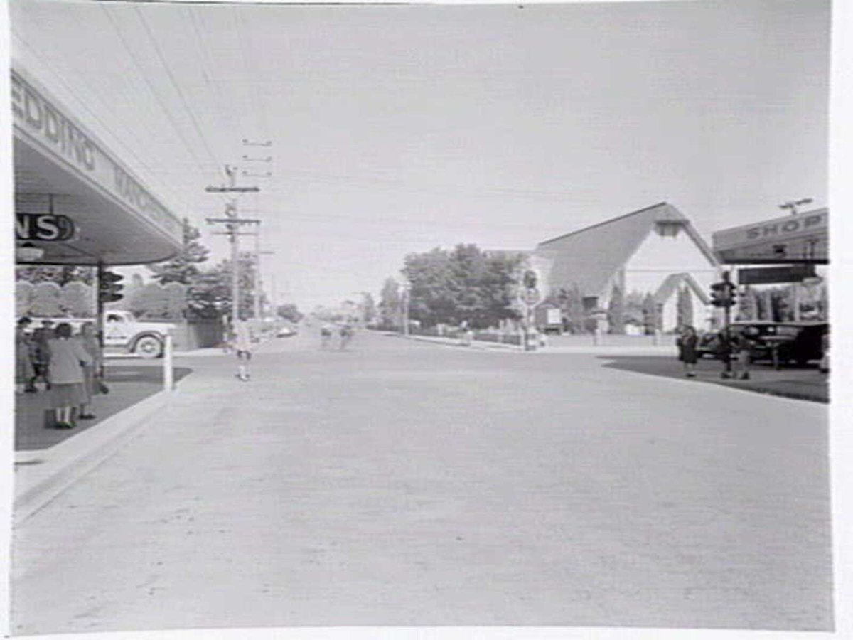 Intersection of High St. and Murray Rd., Preston, with All Saints Church on corner (c. 1949)