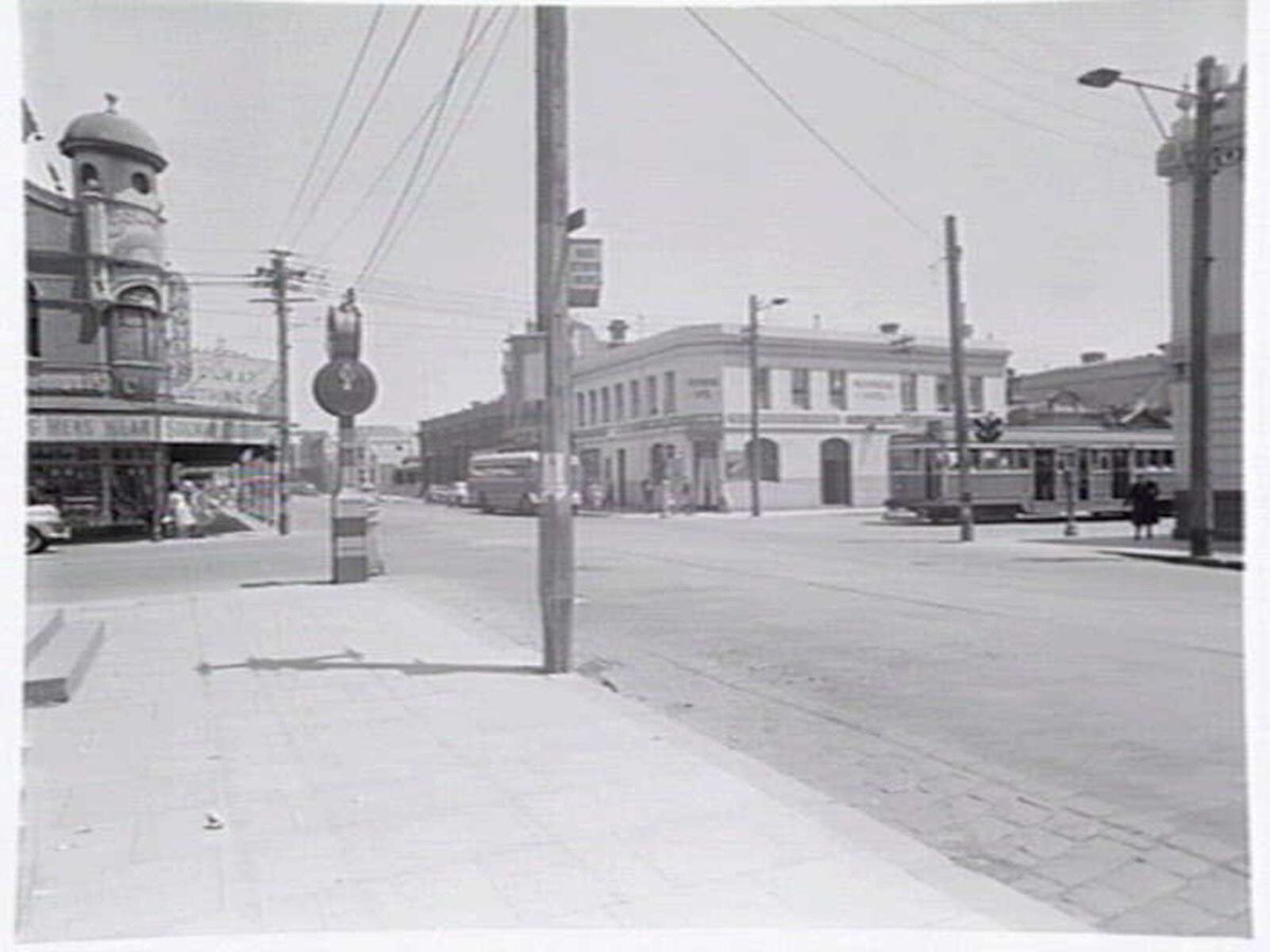 Intersection of Johnston & Brunswick Sts., Fitzroy, showing Provincial Hotel and Solway mens' store (c. 1949)