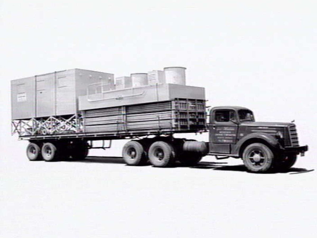 Loaded semi trailer belonging to Geo. Houlder, Brunswick, interstate cartage hauler (c. 1952)