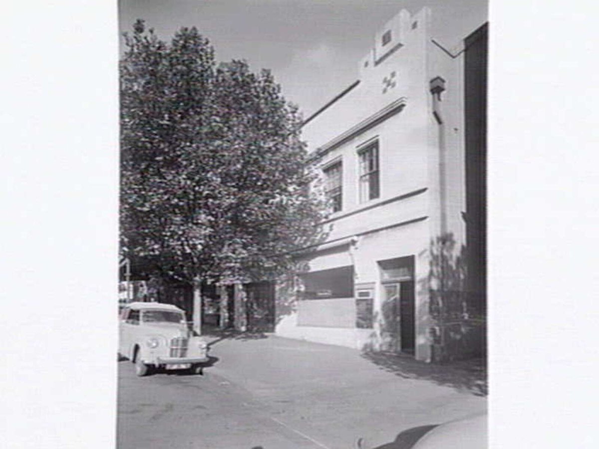 Car parked outside Joubert's building, 575 Bourke St., Melbourne, Melbourne City (c. 1953)